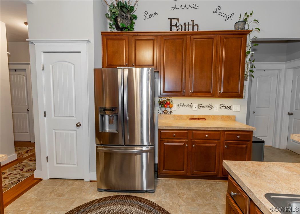 337 Shelton Place Aylett, VA 23009 - Photo 19 of 34 a kitchen with a refrigerator sink and cabinets