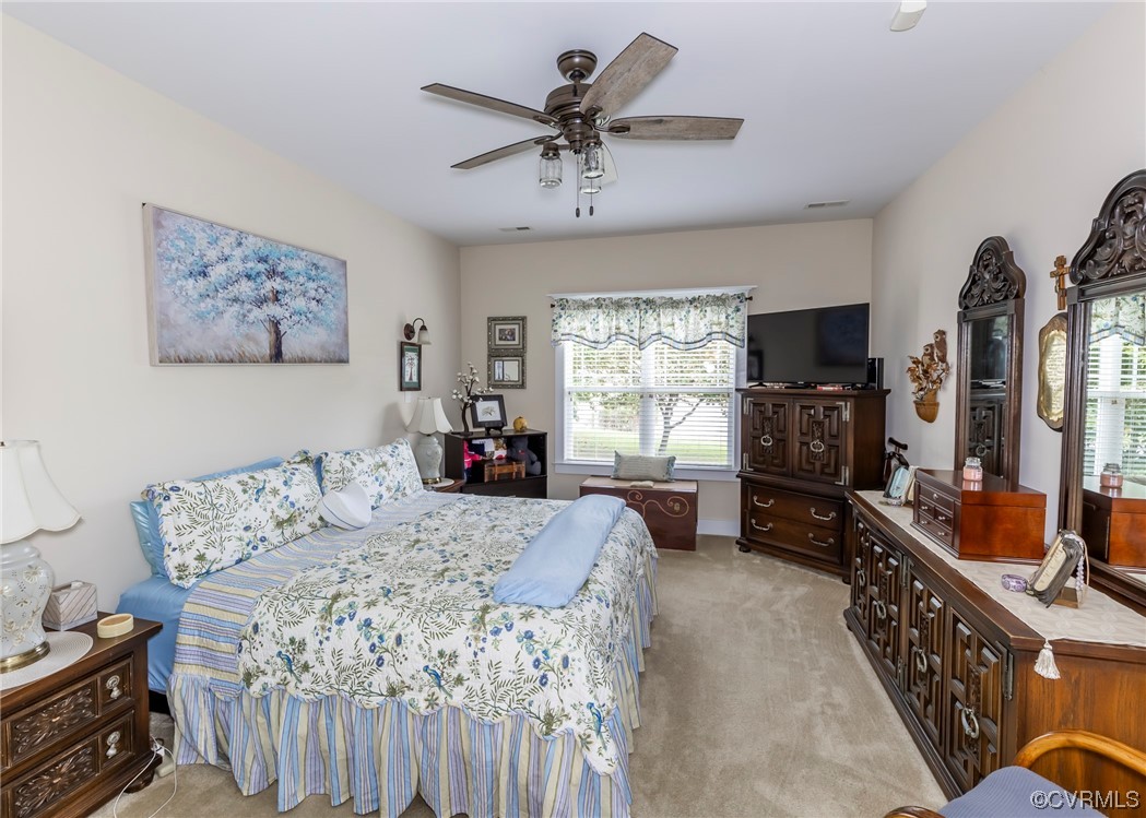 337 Shelton Place Aylett, VA 23009 - Photo 20 of 34 a living room with furniture a flat screen tv and a window