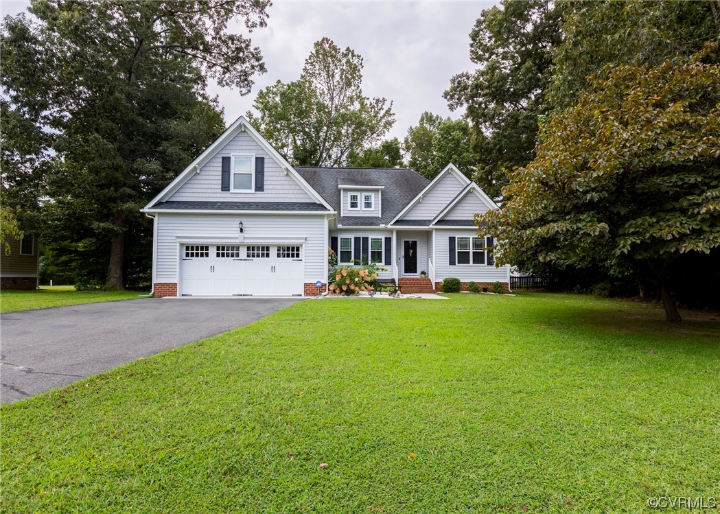 337 Shelton Place Aylett, VA 23009 - Photo 2 of 34 a view of a yard in front of house