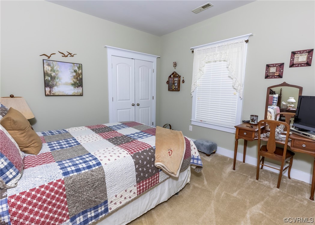 337 Shelton Place Aylett, VA 23009 - Photo 27 of 34 a bedroom with a bed and furniture