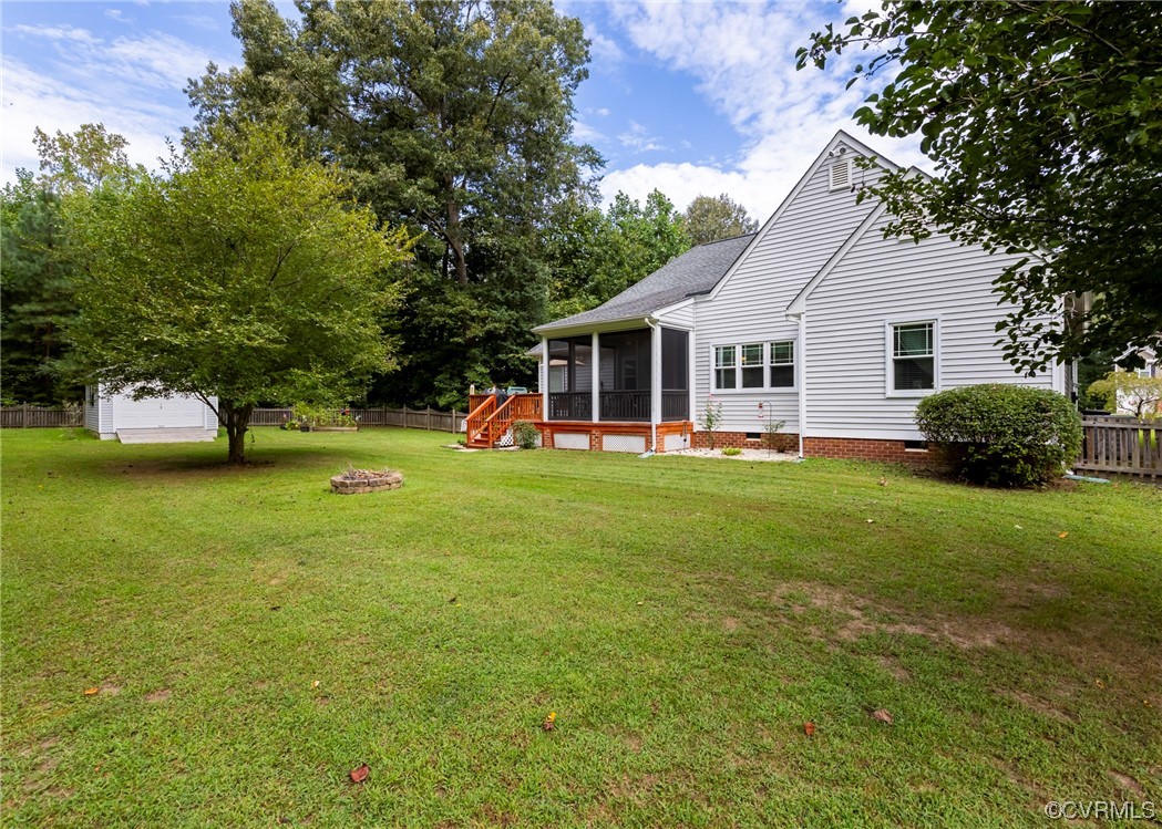 337 Shelton Place Aylett, VA 23009 - Photo 6 of 34 a view of a house with a backyard porch and sitting area