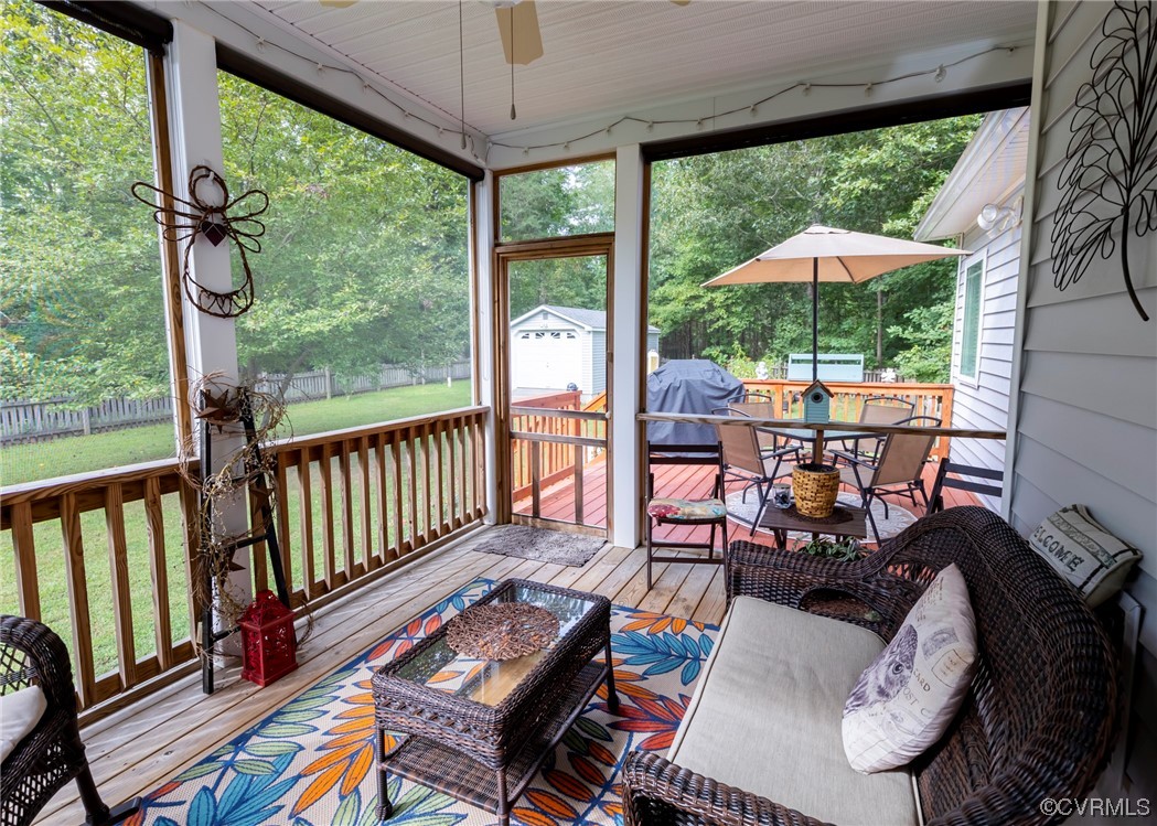 337 Shelton Place Aylett, VA 23009 - Photo 10 of 34 a balcony with furniture and umbrella
