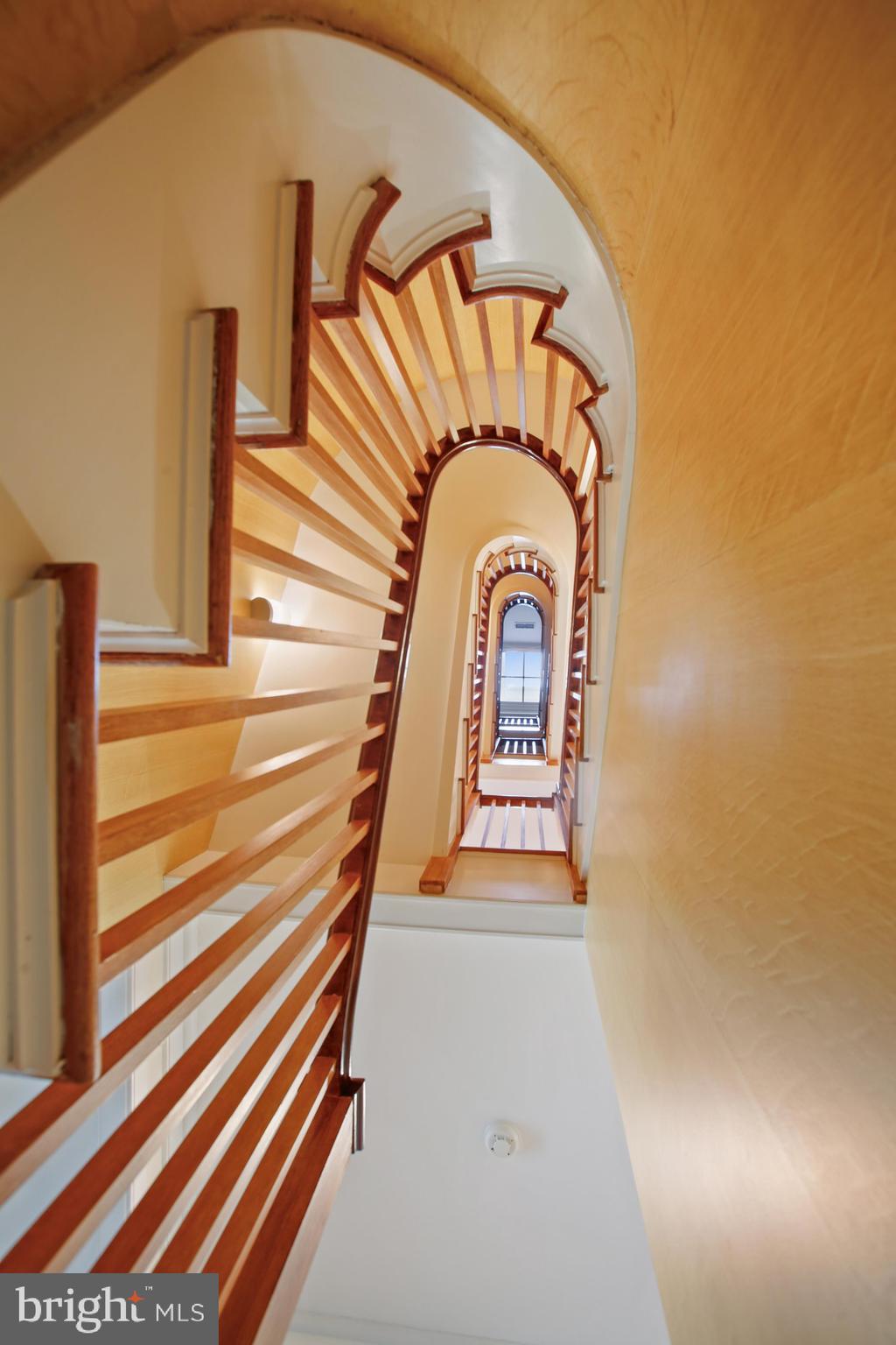 700 Belgrove Road McLean, VA 22101 - Photo 32 of 86 Spiral Staircase looking up from lower level