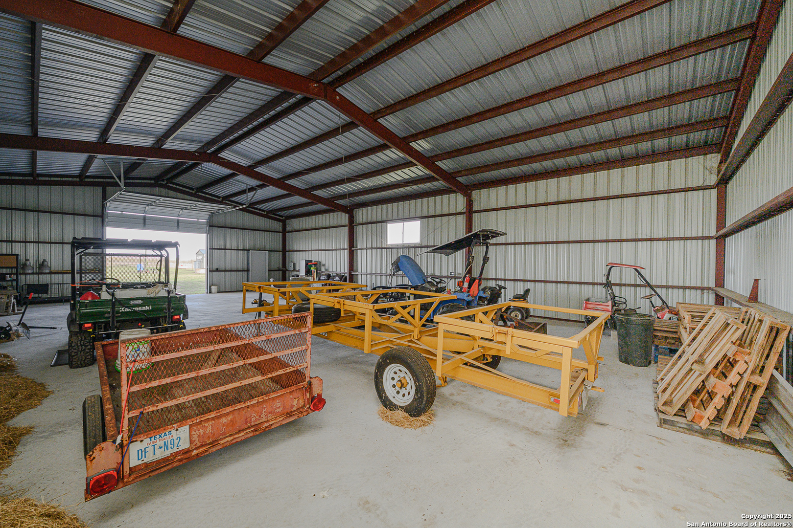 1061 County Road 156 Kenedy, TX 78119 - Photo 25 of 34 a view of a room with gym equipment