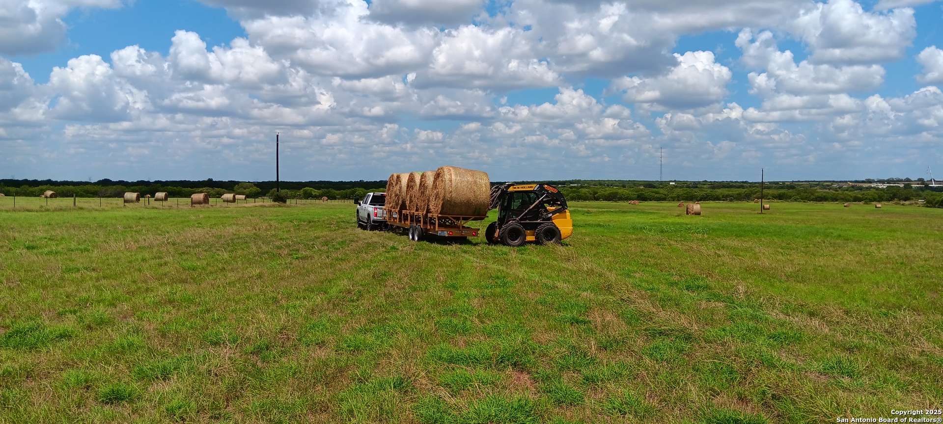 1061 County Road 156 Kenedy, TX 78119 - Photo 6 of 34 a view of a big yard