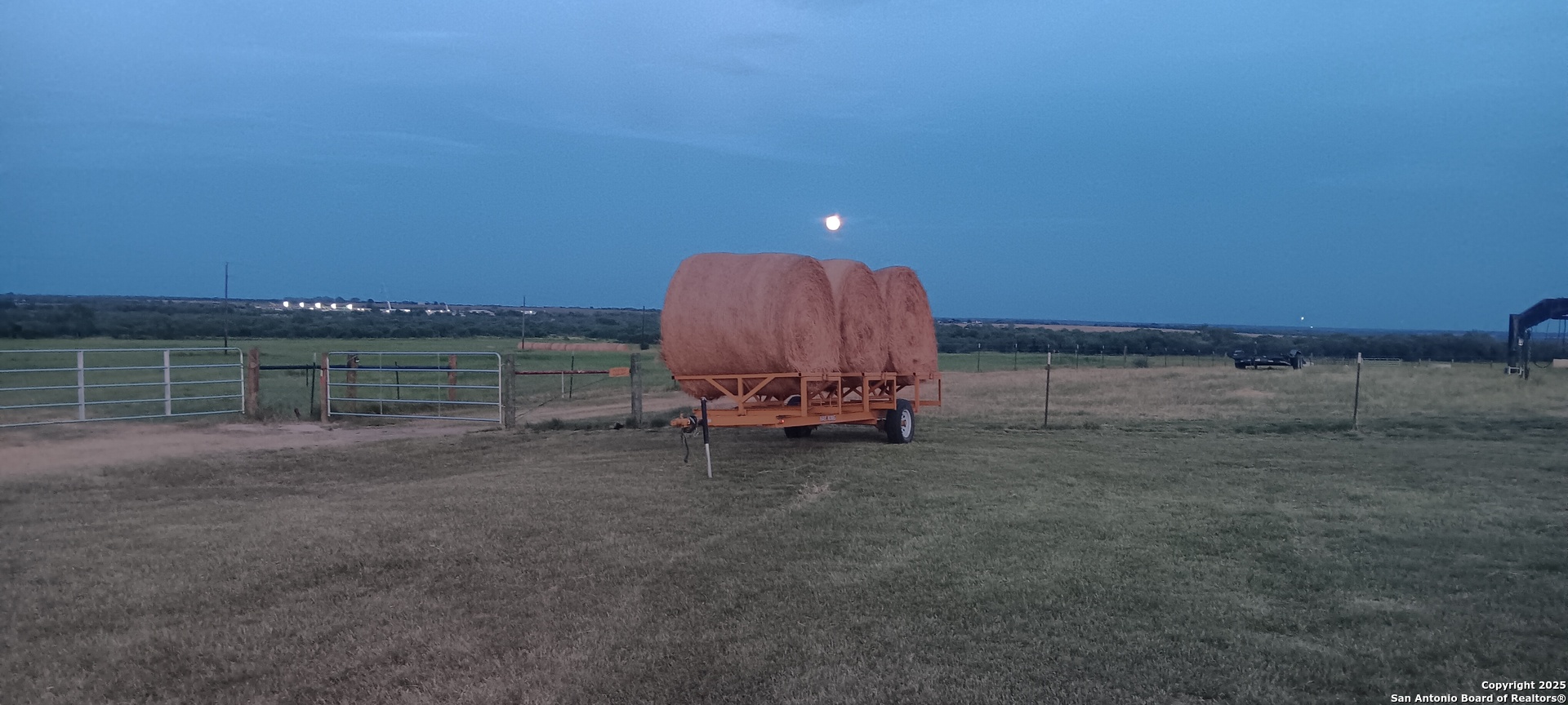 1061 County Road 156 Kenedy, TX 78119 - Photo 9 of 34 a view of a backyard