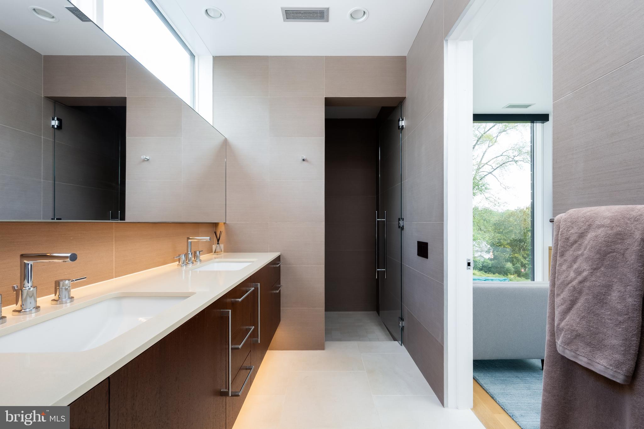 9119 Levelle Drive Chevy Chase, MD 20815 - Photo 24 of 48 Primary bath with under mount lighting