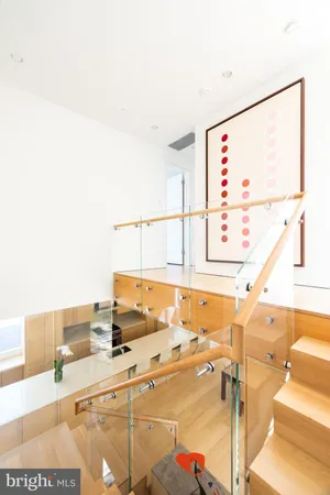 a bathroom with a sink and a large mirror