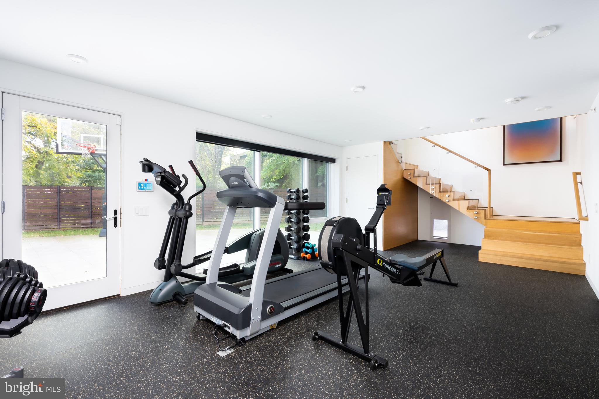 9119 Levelle Drive Chevy Chase, MD 20815 - Photo 32 of 48 a view of a room with gym equipment