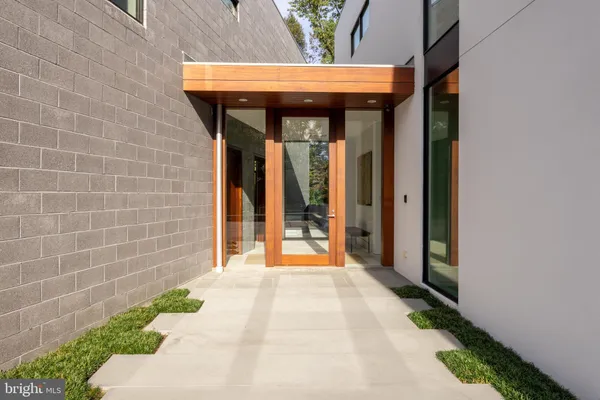 a front view of a house with a porch