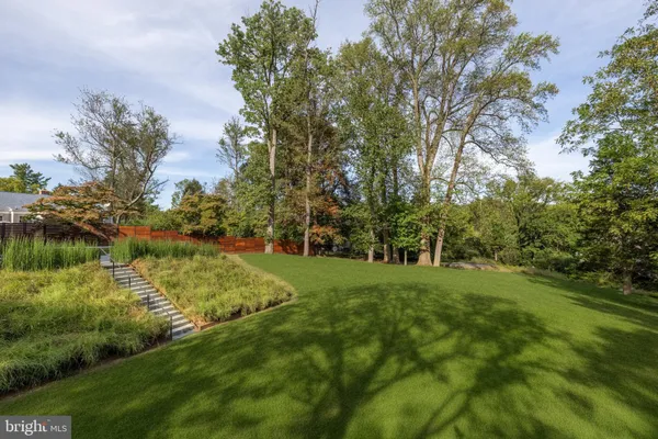 a view of a garden with a lake