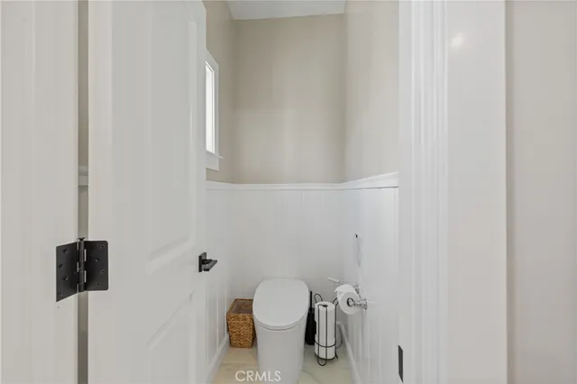 a view of a bathroom from a hallway