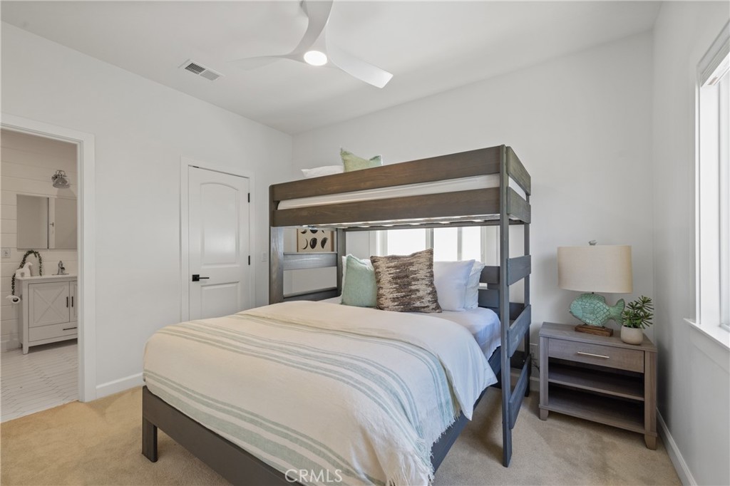 1703 South Ola Vista San Clemente, CA 92672 - Photo 27 of 45 a bedroom with a bed and a cabinets