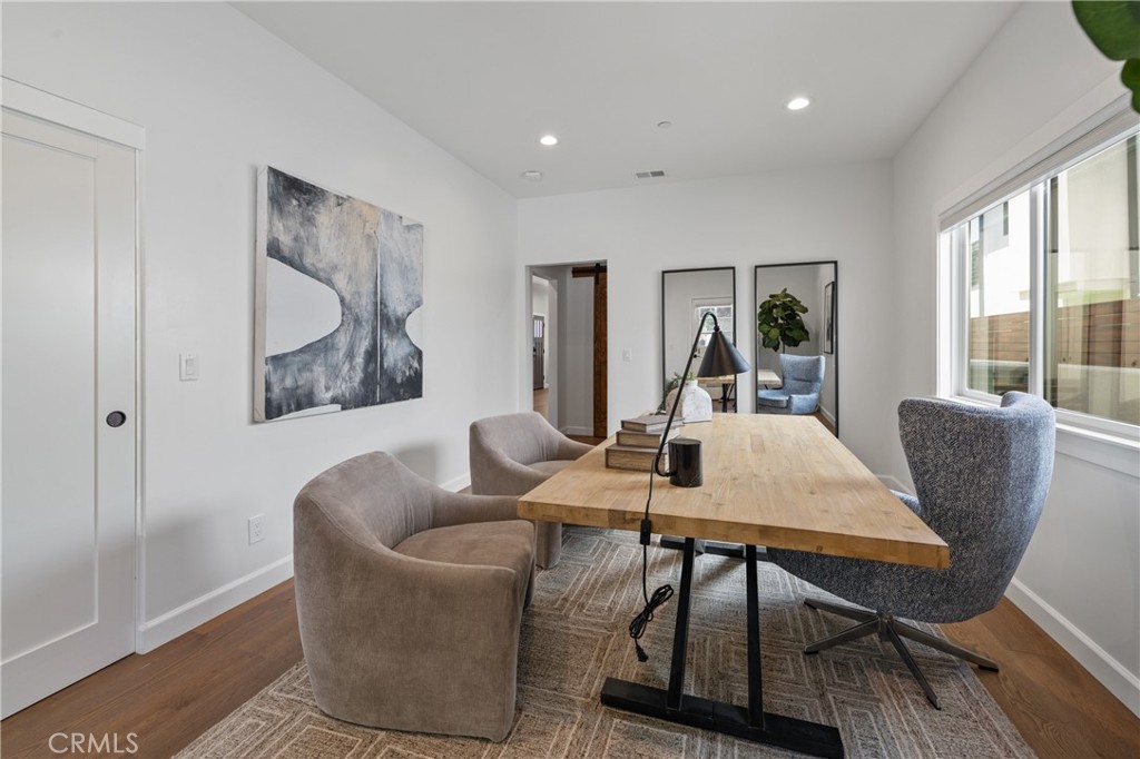 1703 South Ola Vista San Clemente, CA 92672 - Photo 33 of 45 a view of a dining room with furniture window and wooden floor