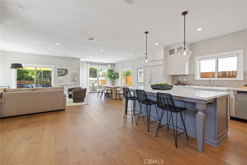 1703 South Ola Vista San Clemente, CA 92672 - Photo 5 of 45 a living room with furniture a dining table and chairs