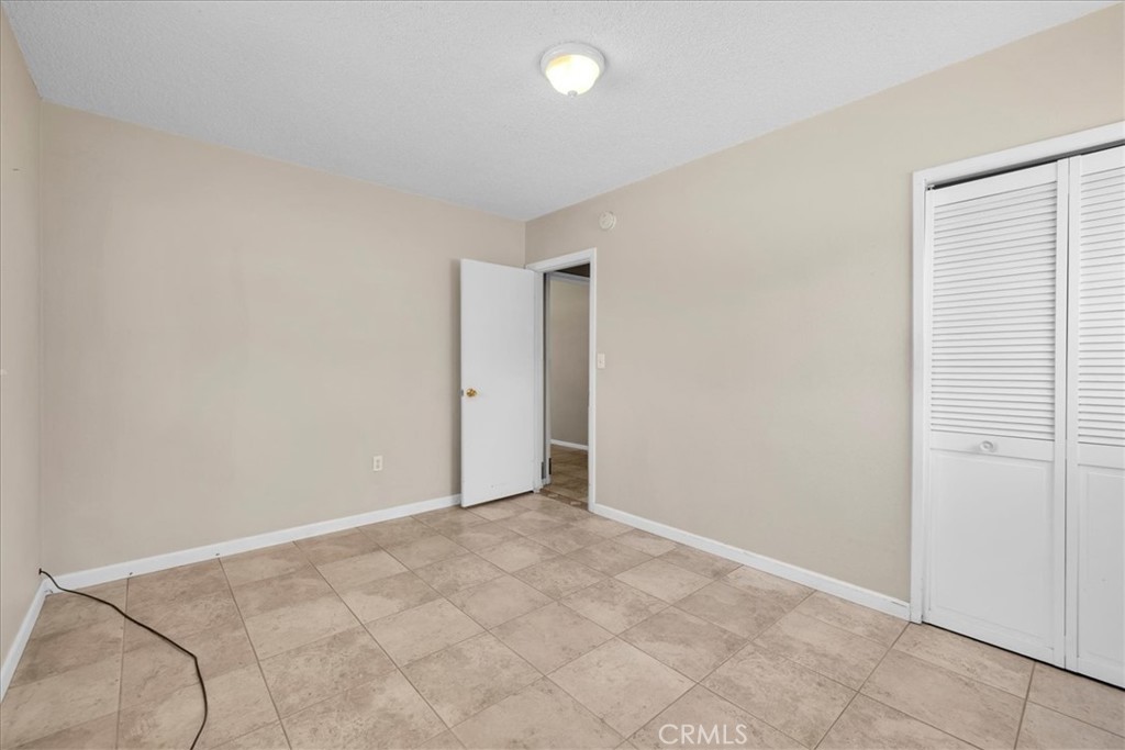 7337 Condalia Avenue Yucca Valley, CA 92284 - Photo 13 of 48 an empty room with an entryway