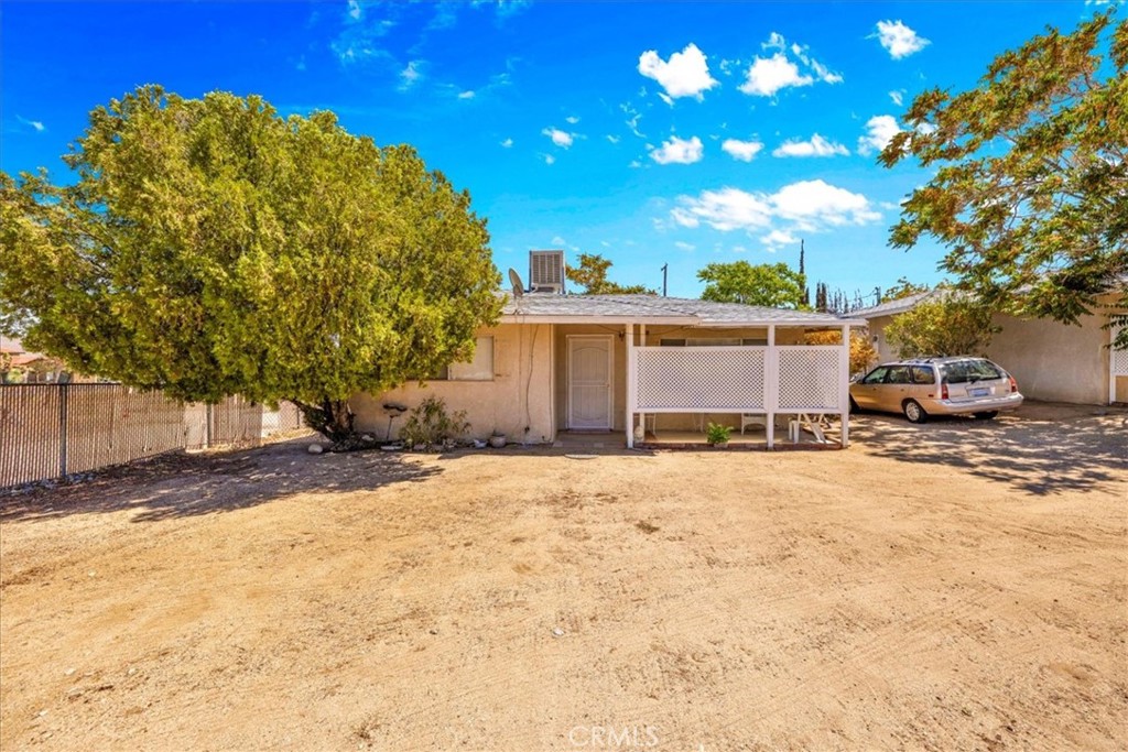 7337 Condalia Avenue Yucca Valley, CA 92284 - Photo 22 of 48 a view of a house with a snow on the road