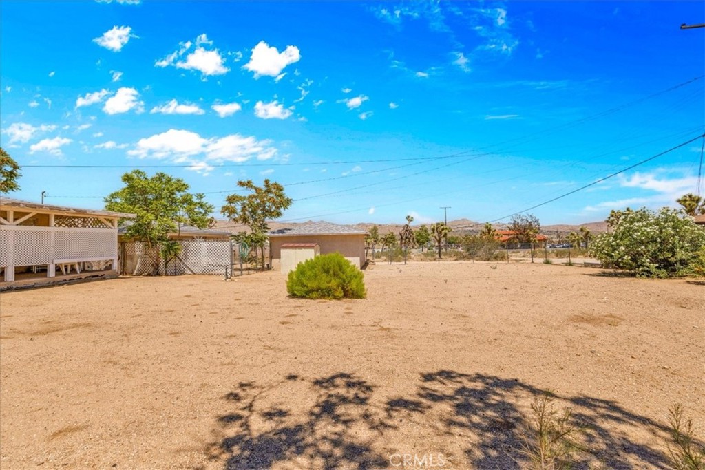 7337 Condalia Avenue Yucca Valley, CA 92284 - Photo 29 of 48 a view of a lake and mountain
