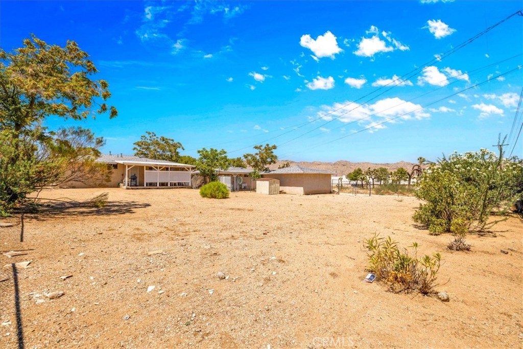 7337 Condalia Avenue Yucca Valley, CA 92284 - Photo 30 of 48 a view of ocean with a house