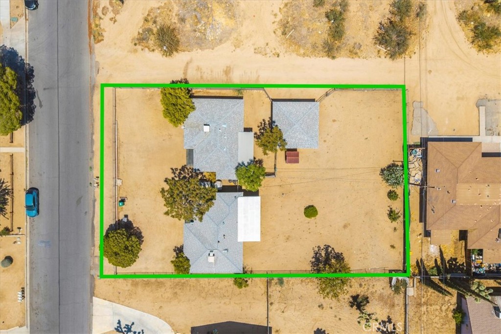 7337 Condalia Avenue Yucca Valley, CA 92284 - Photo 35 of 48 an aerial view of a house with a yard