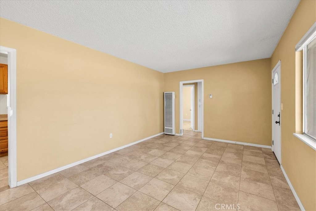 7337 Condalia Avenue Yucca Valley, CA 92284 - Photo 4 of 48 a view of an empty room and window