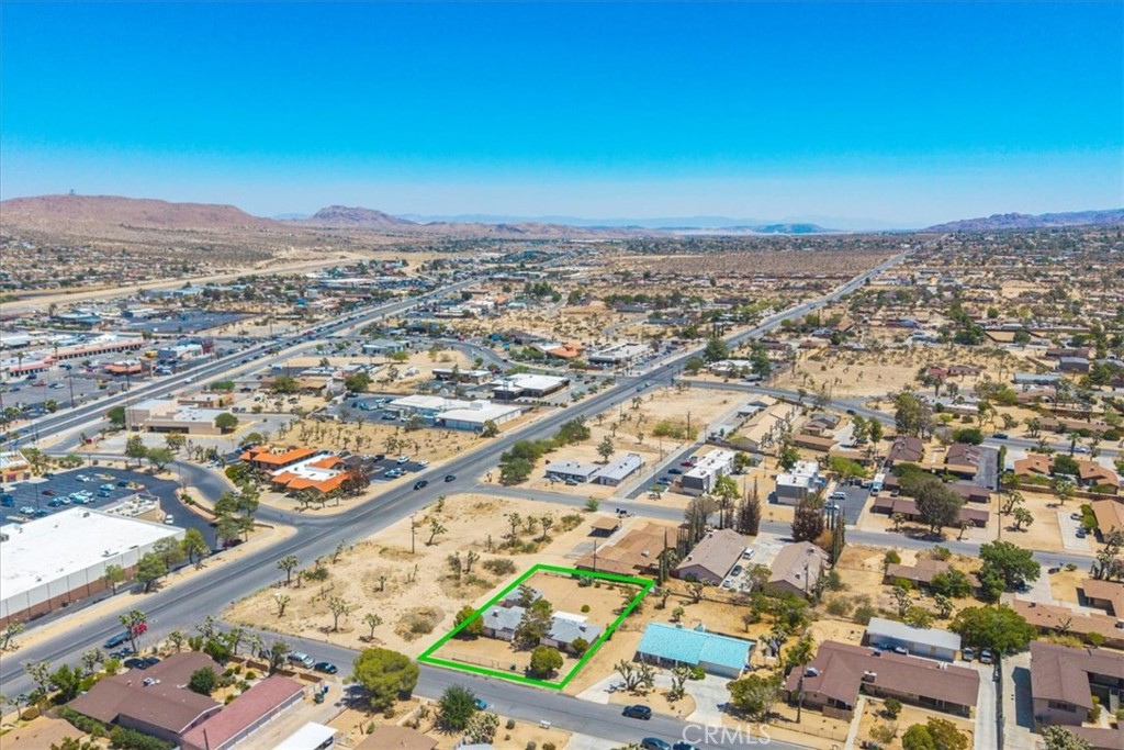 7337 Condalia Avenue Yucca Valley, CA 92284 - Photo 44 of 48 an aerial view of residential building with parking space