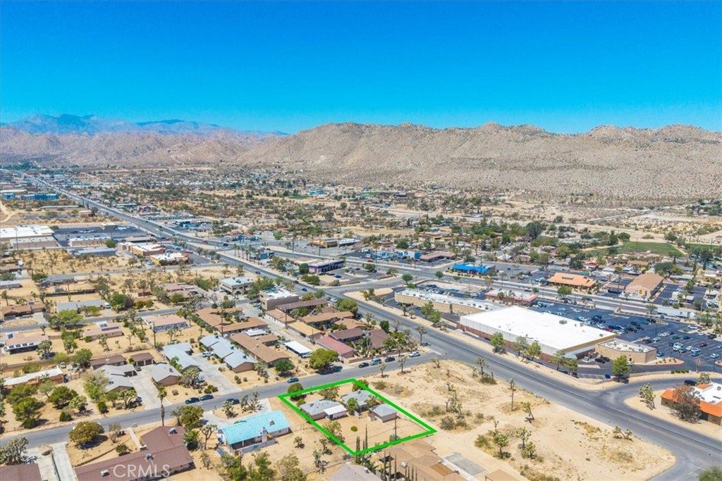 7337 Condalia Avenue Yucca Valley, CA 92284 - Photo 47 of 48 an aerial view of residential houses with outdoor space