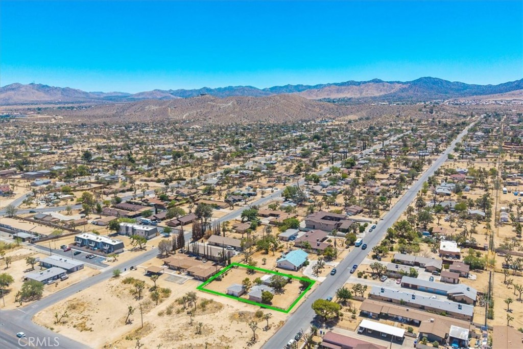 7337 Condalia Avenue Yucca Valley, CA 92284 - Photo 48 of 48 an aerial view of residential houses with outdoor space