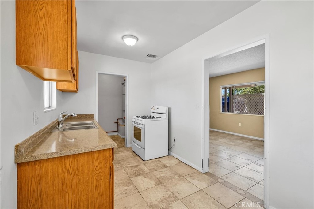 7337 Condalia Avenue Yucca Valley, CA 92284 - Photo 9 of 48 a bathroom with a sink a toilet and mirror