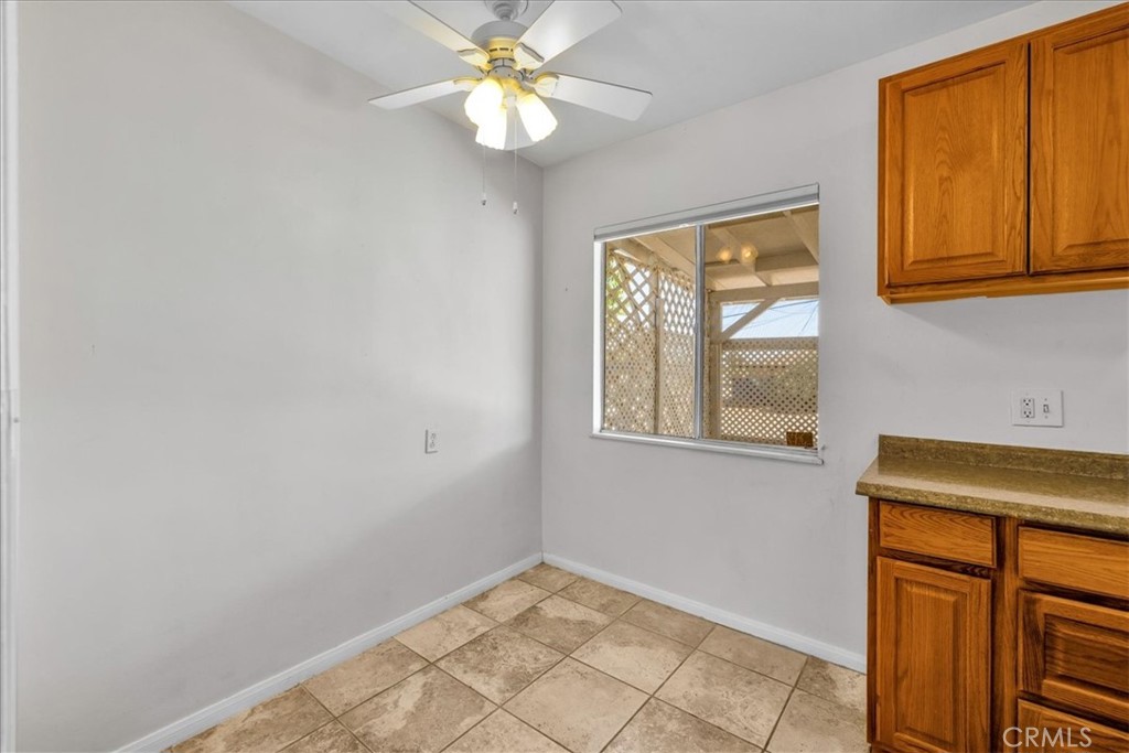 7337 Condalia Avenue Yucca Valley, CA 92284 - Photo 10 of 48 an empty room with windows