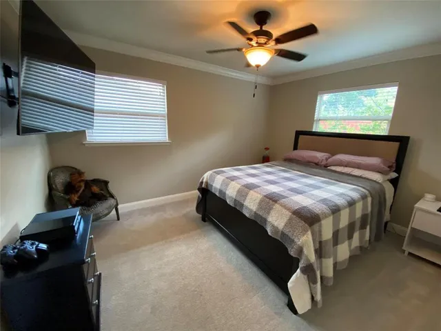 a bathroom with a double vanity sink and mirror