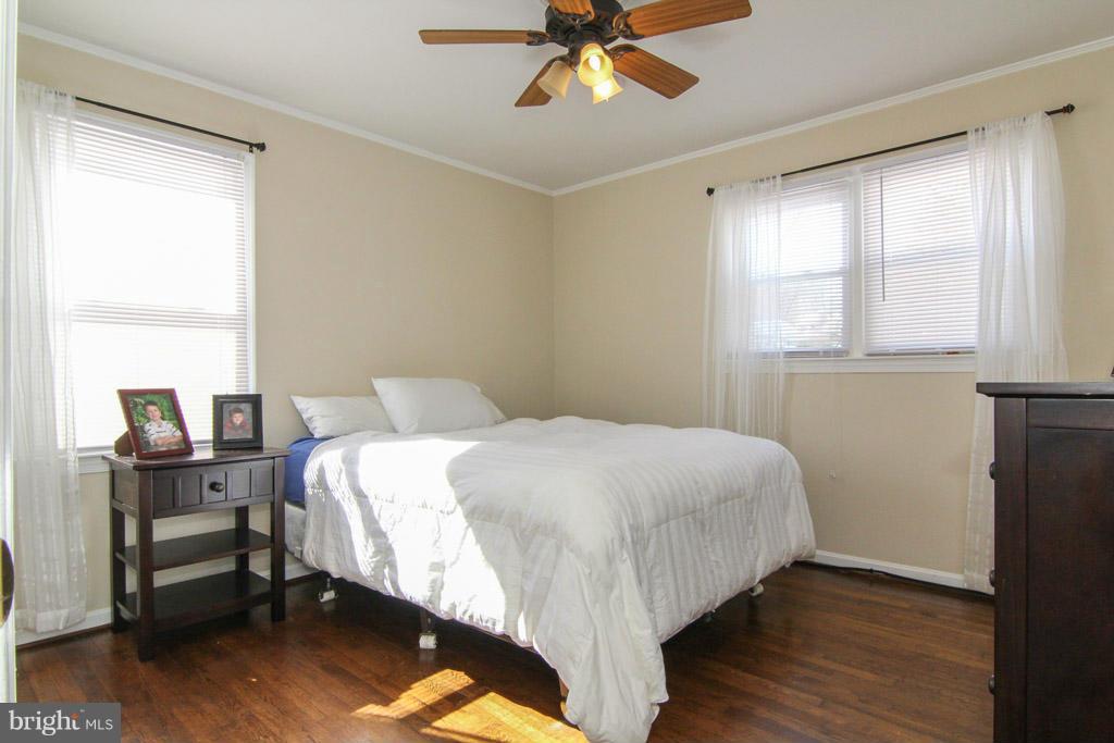 3205 Holloway Road Falls Church, VA 22042 - Photo 13 of 30 a bedroom with a bed and a window