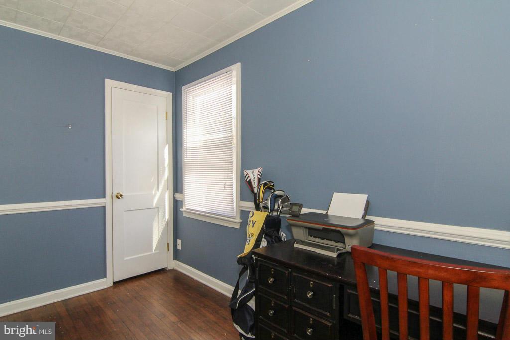 3205 Holloway Road Falls Church, VA 22042 - Photo 15 of 30 a view of a workspace with furniture and a window