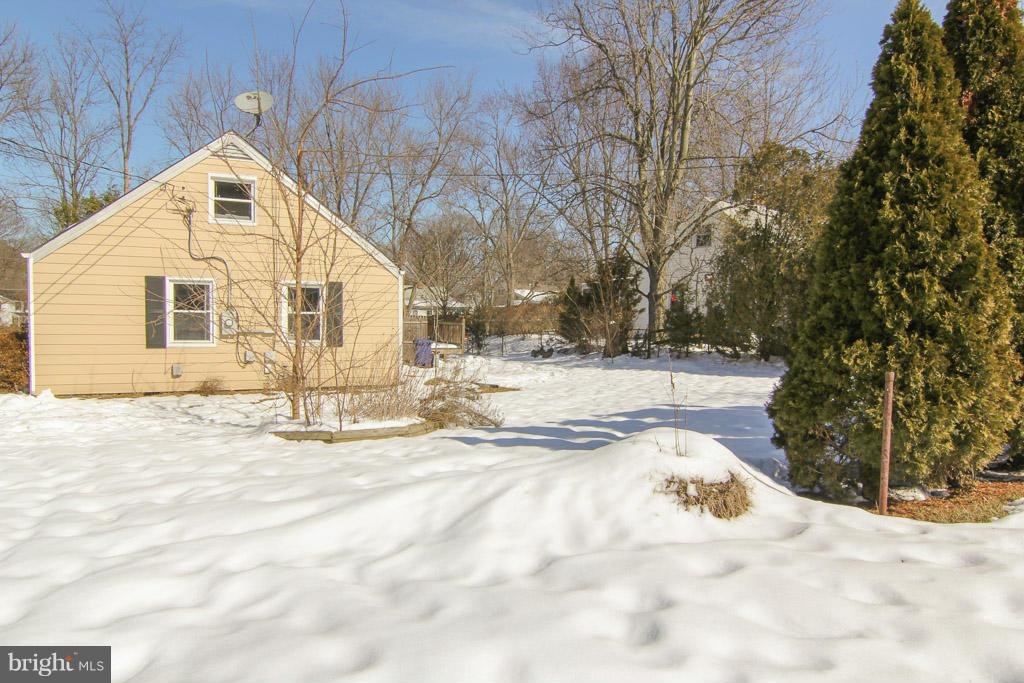 3205 Holloway Road Falls Church, VA 22042 - Photo 28 of 30 a view of a house with snow on the road