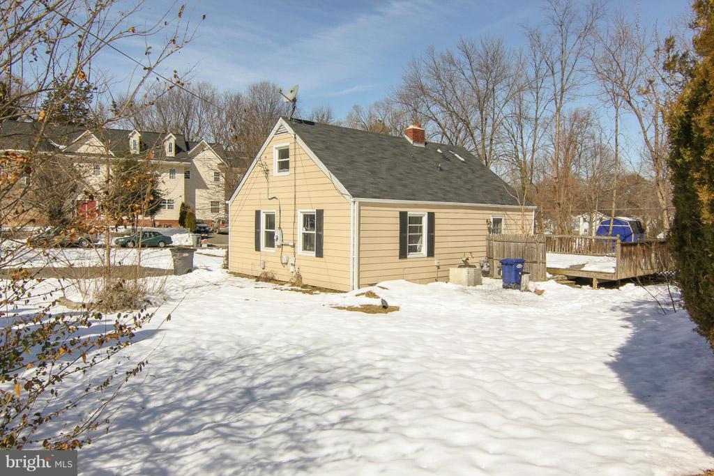 3205 Holloway Road Falls Church, VA 22042 - Photo 29 of 30 a view of a house with snow on the road