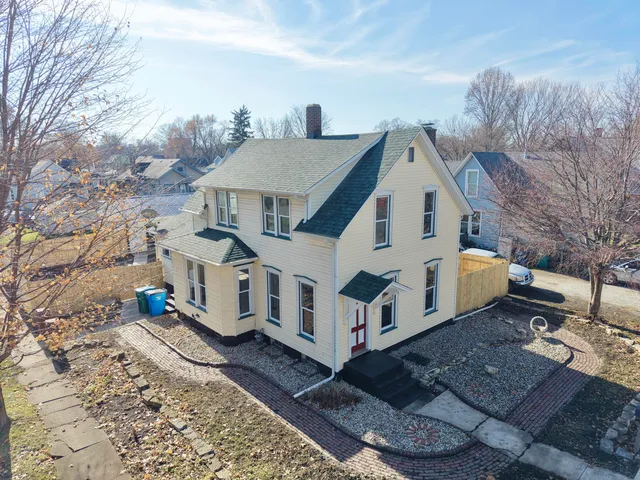 a large white building with a white roof