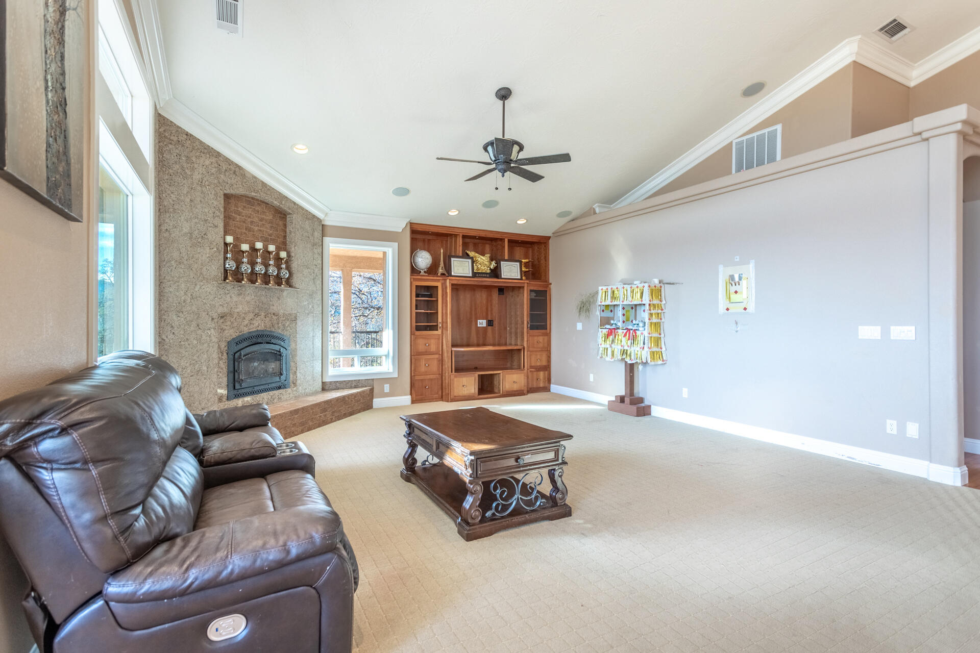 7775 Muletown Road Redding, CA 96001 - Photo 14 of 45 a living room with furniture and a fireplace