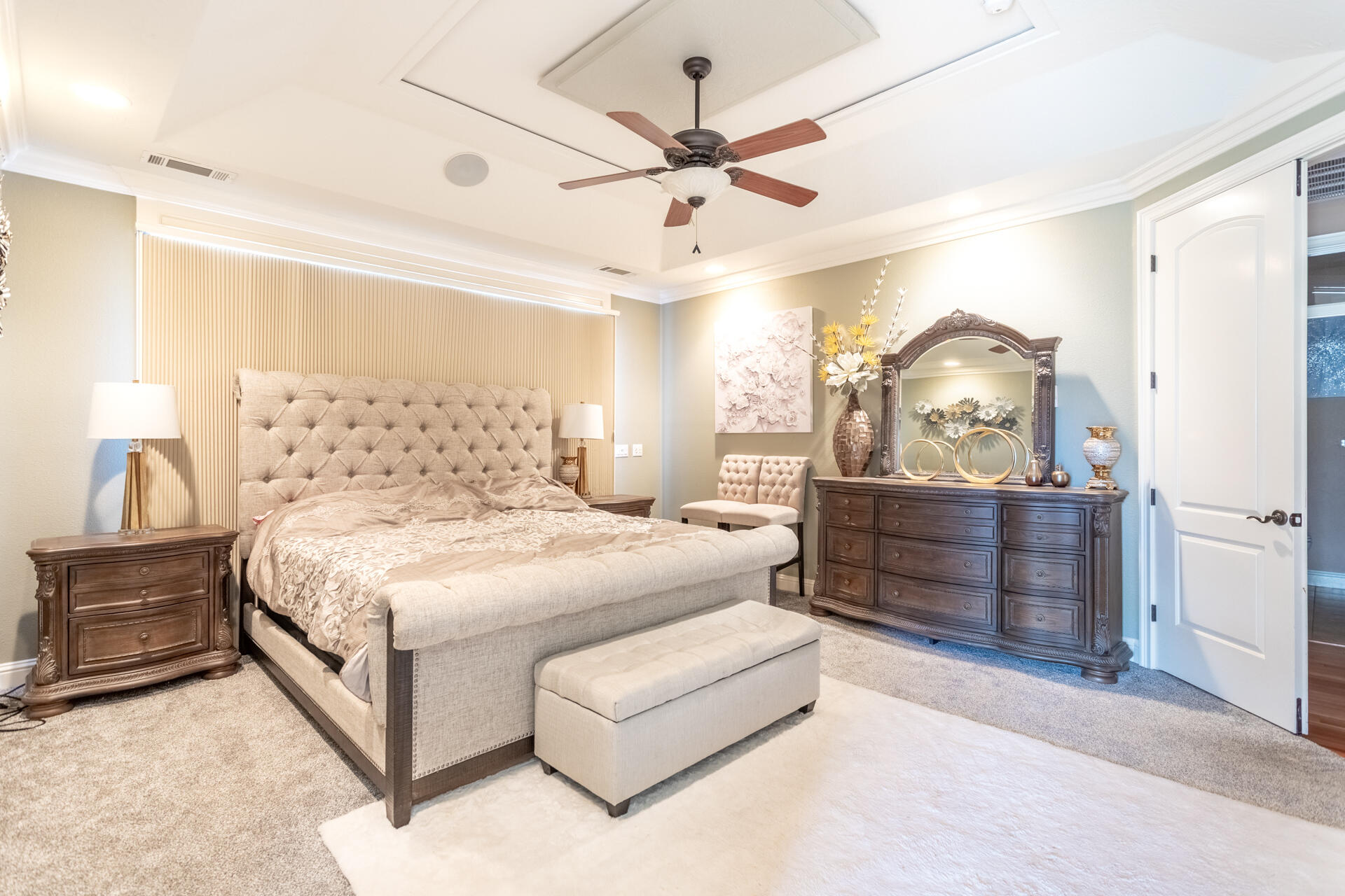 7775 Muletown Road Redding, CA 96001 - Photo 22 of 45 a spacious bedroom with a bed and a dresser