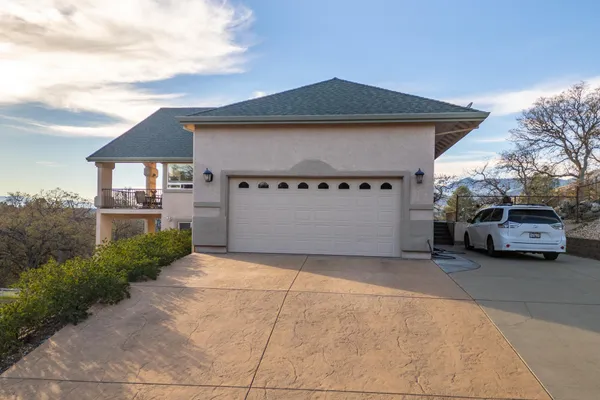 a house view with a garden space