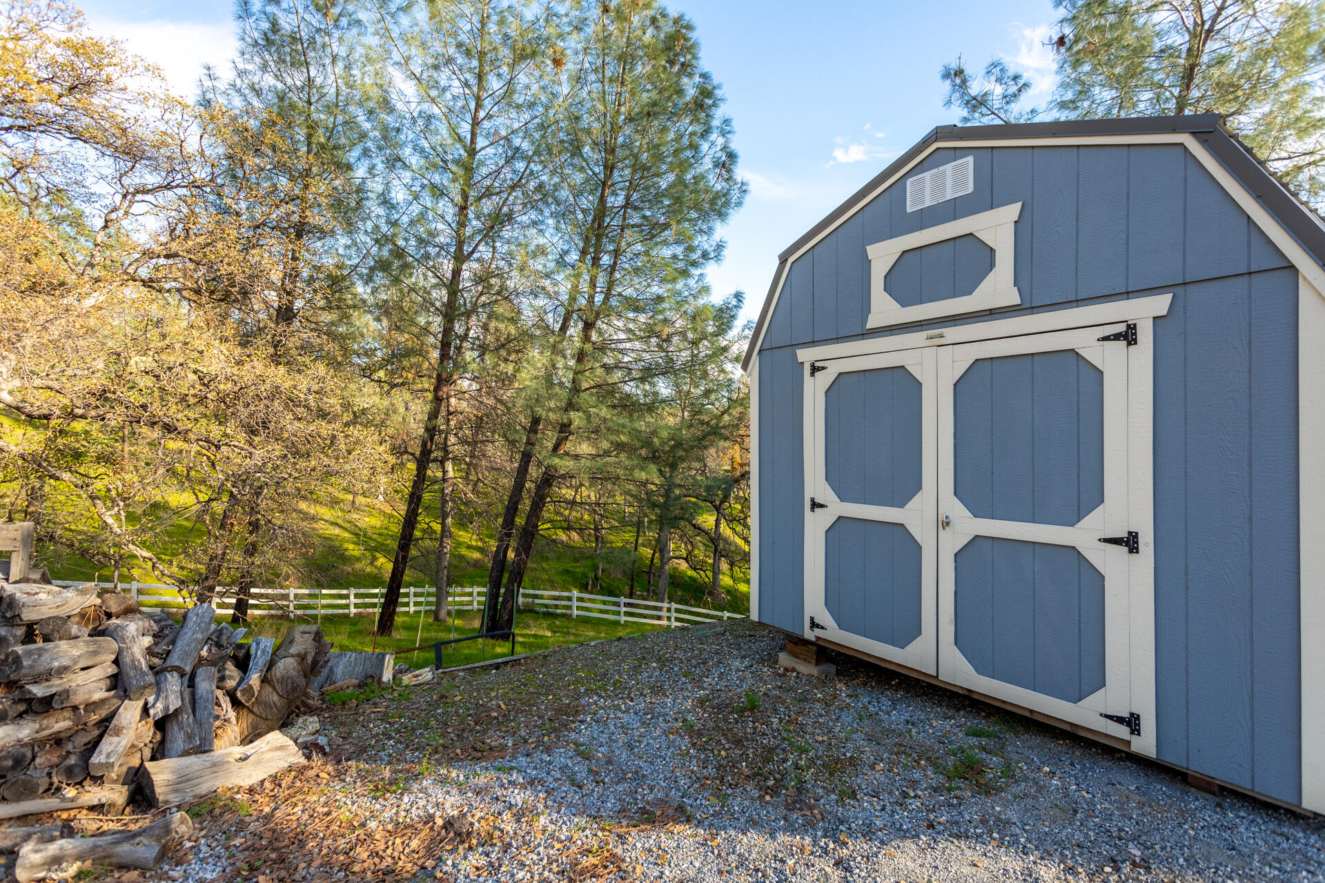 7775 Muletown Road Redding, CA 96001 - Photo 39 of 45 a view of a house with a yard