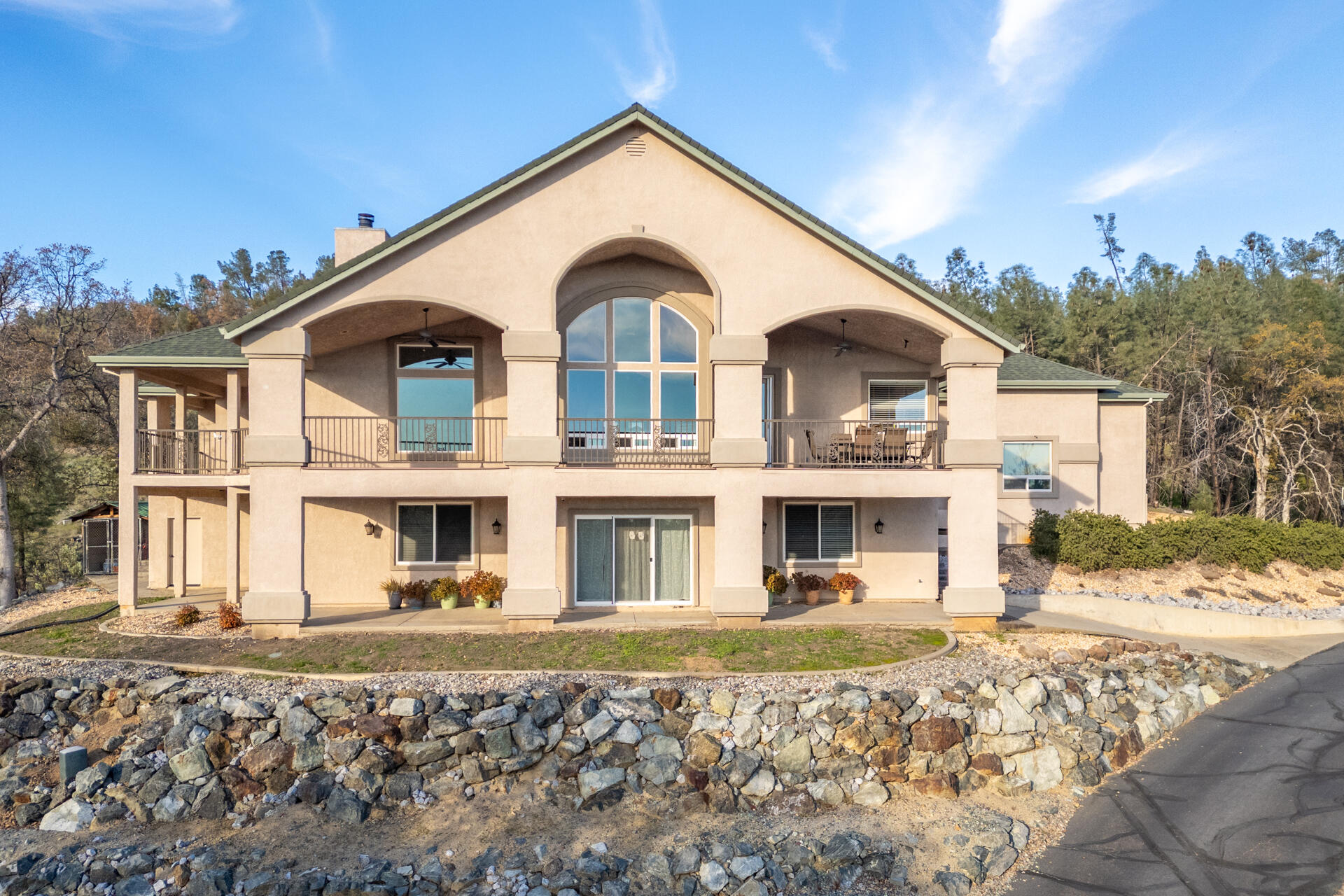 7775 Muletown Road Redding, CA 96001 - Photo 42 of 45 a front view of a house with a yard