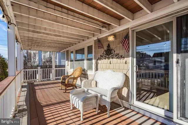 a view of a hallway with washer and dryer