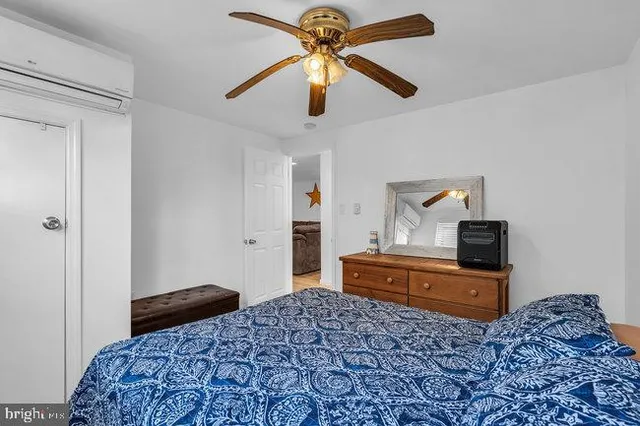 a view of a patio with table and chairs