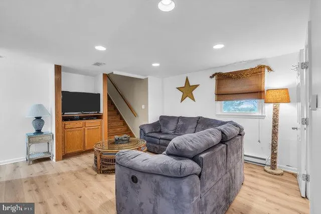 a kitchen with a refrigerator sink and stove