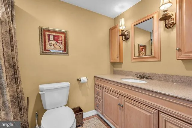 a bedroom with a bed and a cabinets