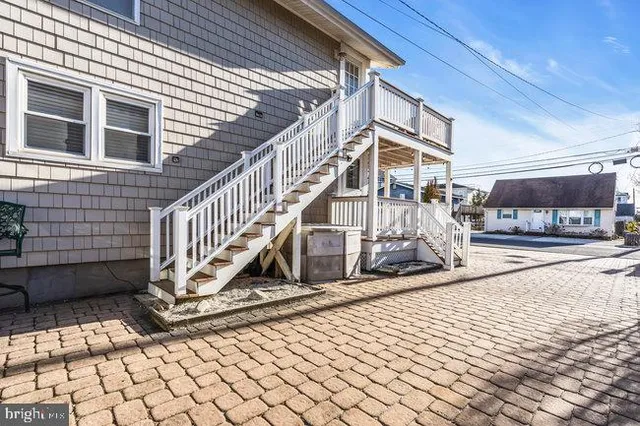 a kitchen with stainless steel appliances granite countertop a sink and stove top oven