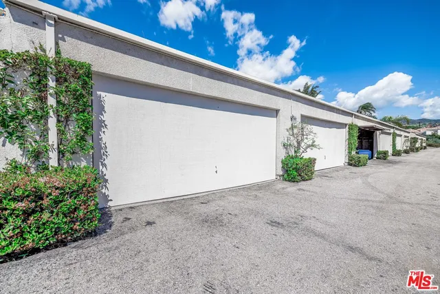 a view of a house with a street
