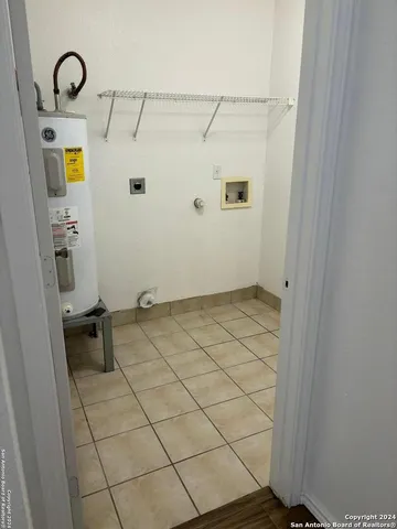 a bathroom with a sink and a shower