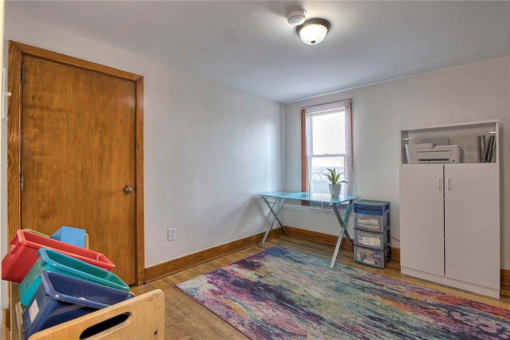 155 Lenox Street Uniontown, PA 15401 - Photo 22 of 32 a work room with furniture and wooden floor