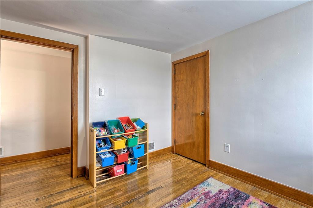 155 Lenox Street Uniontown, PA 15401 - Photo 24 of 32 a room with wooden floor and a window